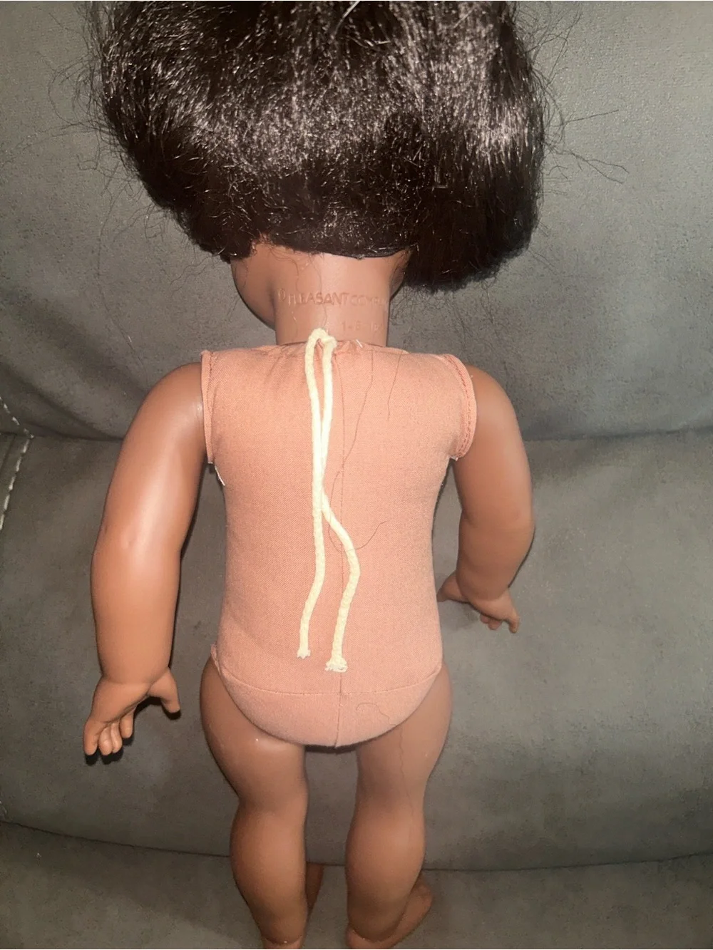American Girl Doll with Long Black Hair and Peach Outfit